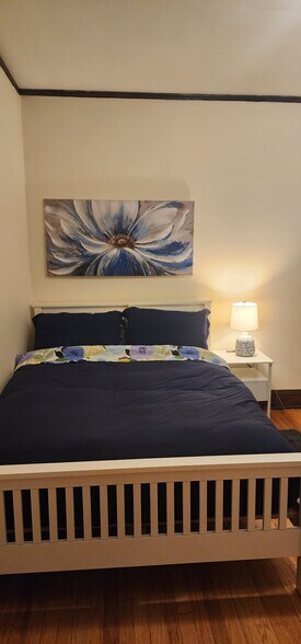 Bedroom with queen bed, dresser, two nightstands, two lamps and two closets - 2018 Lake St