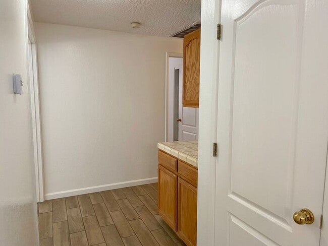 Building Photo - Coming Up Roses - NW Reno 4 Bedroom/3 Car Garage Single Story House