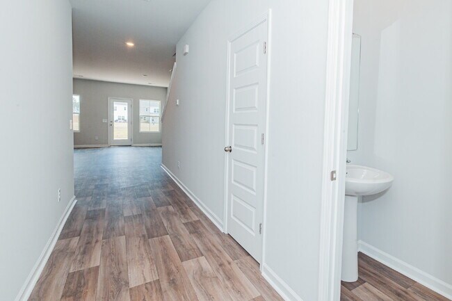 Building Photo - Brand-new 3 bedroom, 2.5 Bath Townhome with pond view