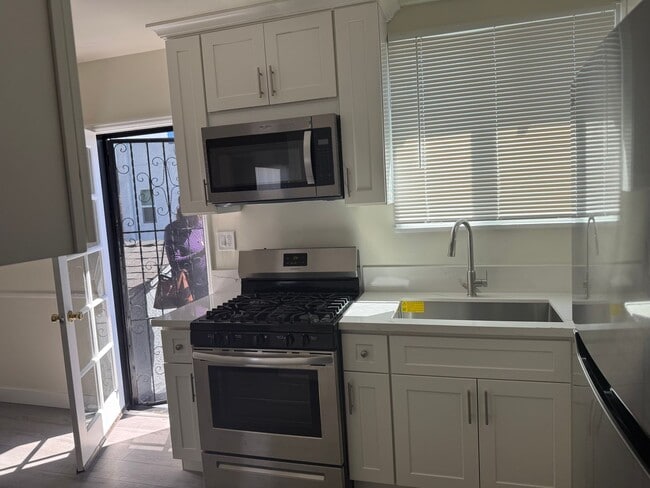 Building Photo - FOR RENT — COMPLETELY REMODELED Apartment