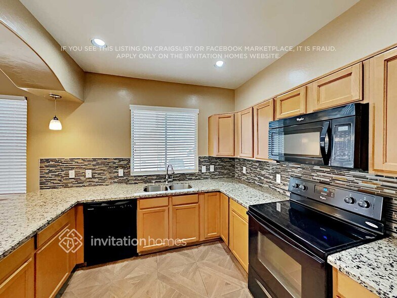 Building Photo - 1323 S 121st Ln