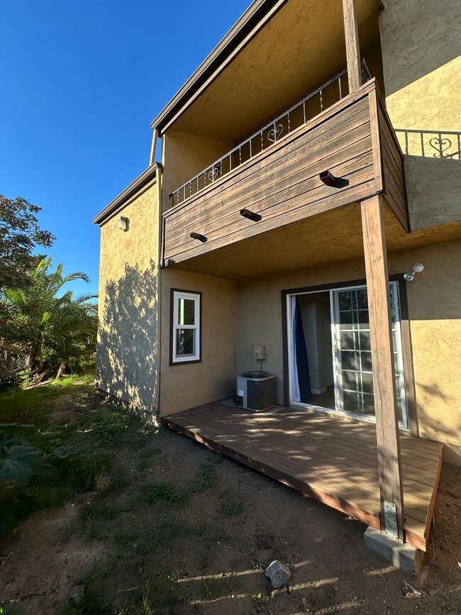 Building Photo - 2BR/1.5BA 2-story condo in El Cajon, gated community with sparkling pool, 2 car attached garage, ...