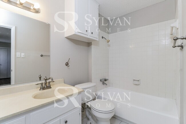 Building Photo - Turn the key. Enter. Smile. Repeat every day!