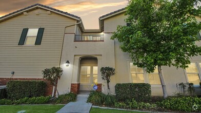 Building Photo - Spacious Brighton Community Townhome