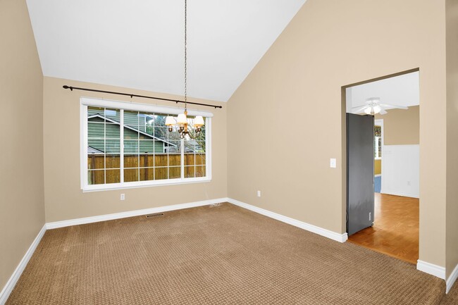 Building Photo - Sunny 5 Bedroom Home with 3 Car Garage in Quiet Neighborhood