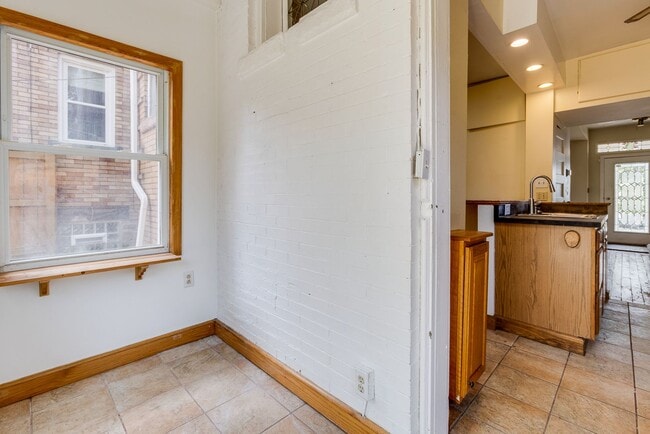 Building Photo - AVAILABLE June 2026 - Beautiful 4 Bedroom, 2 Bath Home w/ Front Porch Swing!