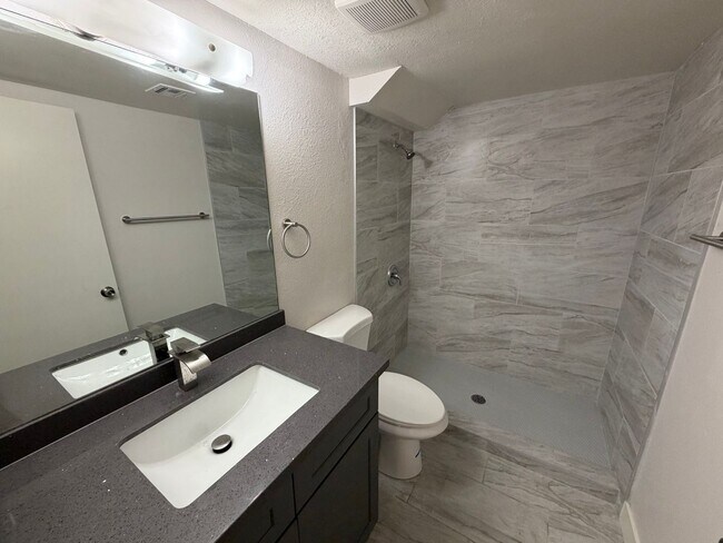 Building Photo - BEAUTIFULLY RENOVATED 3/2/2 CAR WITH DEN