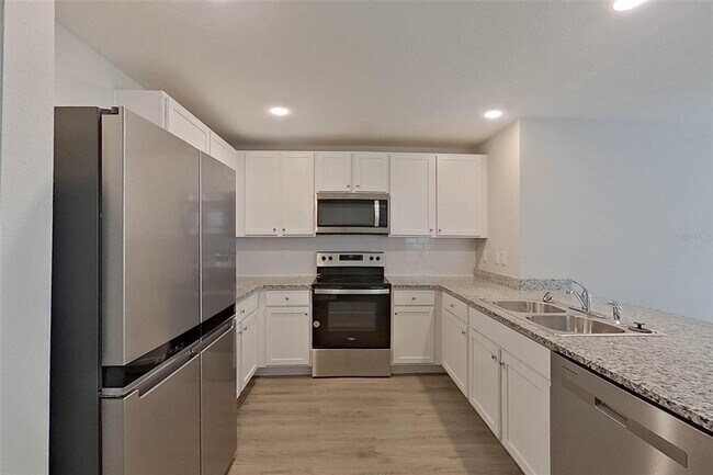 Building Photo - 8665 SW 44th Ct