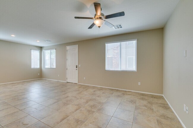Building Photo - Spacious Townhouse with Loft & Rare 3-Car Garage!