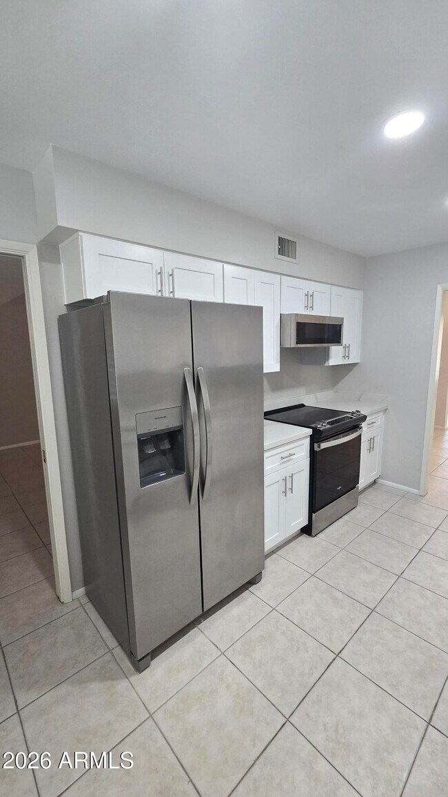 Building Photo - 10715 W Tropicana Cir