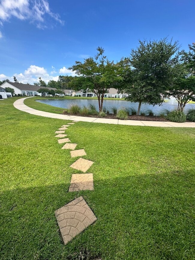 Building Photo - Welcome to this fully furnished 3-bedroom, 3-bathroom townhouse located in the vibrant Hawkeswate...