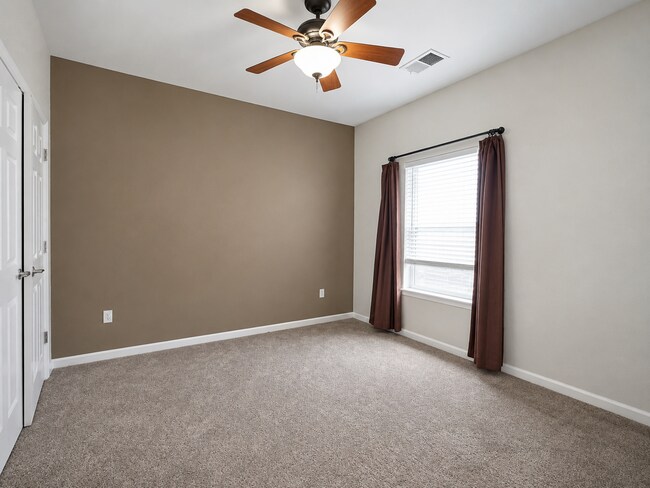 Building Photo - Spacious 2-Bedroom Condo with Garage, Fireplace, Pool & Most Included Utilities