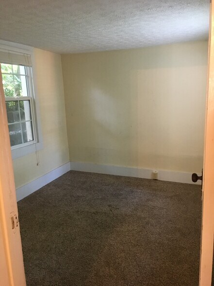 10' x 8.5' room (office space) windows on both sides - 105 Barton Rd