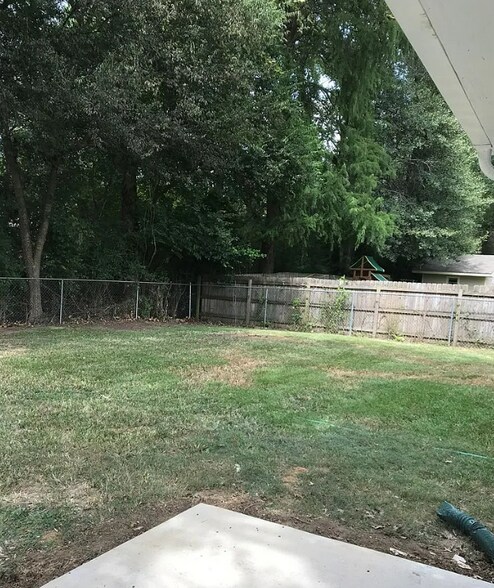 Big fenced in backyard - 8149 Maudie Ln