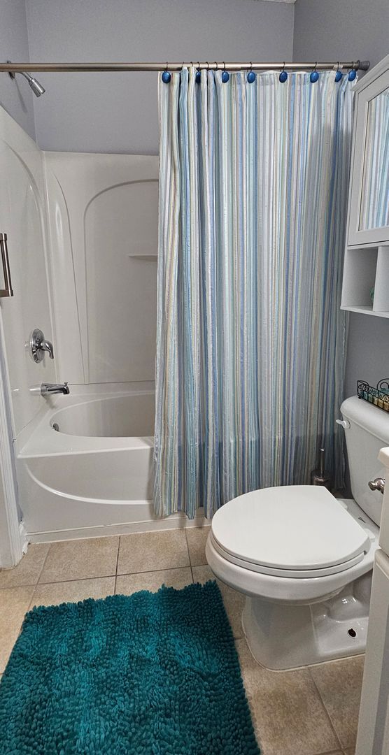 Building Photo - Stunning First-Floor, Fully Furnished Condo with Pond Views