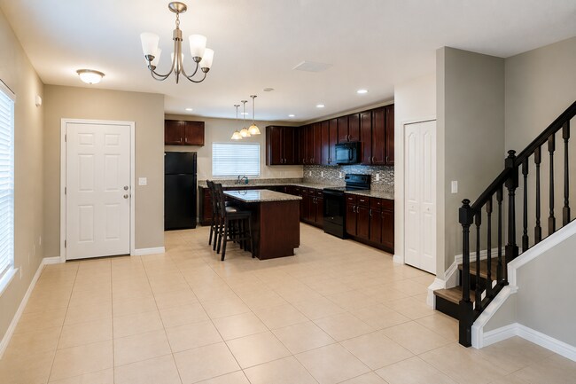 Building Photo - Beautiful Corner-Unit Townhome in a Gated Community!