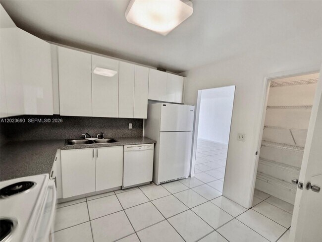 Building Photo - 9801 Collins Ave