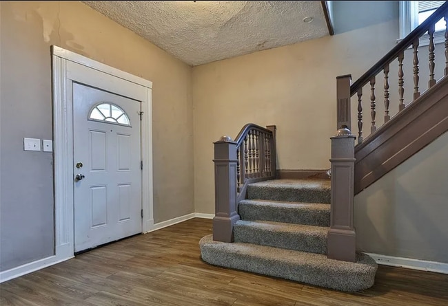 Building Photo - Bright 4-Bed Home with Fenced Yard, Central HVAC, and 3 Finished Levels