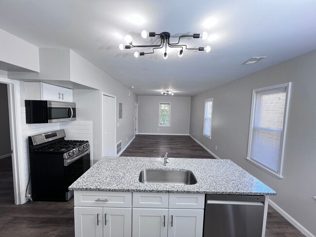 Building Photo - The Duplex on Plumer: Where Modern Meets M...
