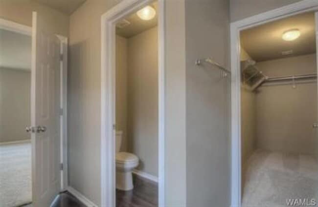 Building Photo - Stylish 4BR/2BA Home with Garage & Privacy...