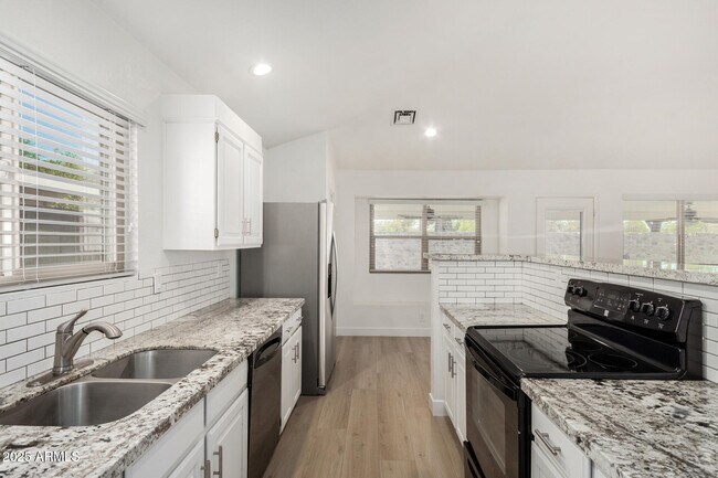 Building Photo - 7139 W McRae Way