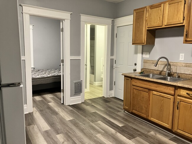 Doors to bedroom, bathroom and hallway from kitchen - 256 Weyl St