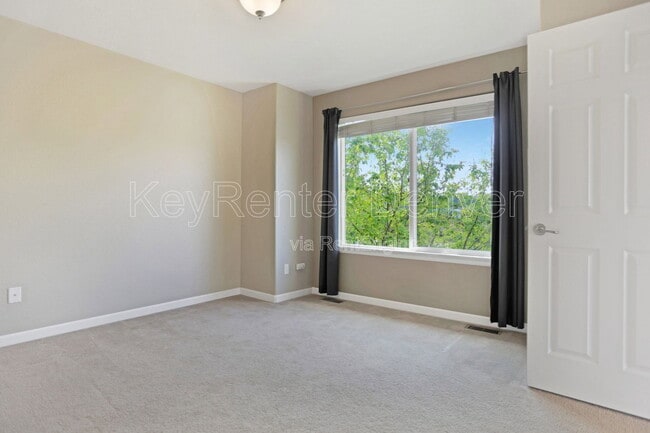 Building Photo - 8989 W 50th Ln
