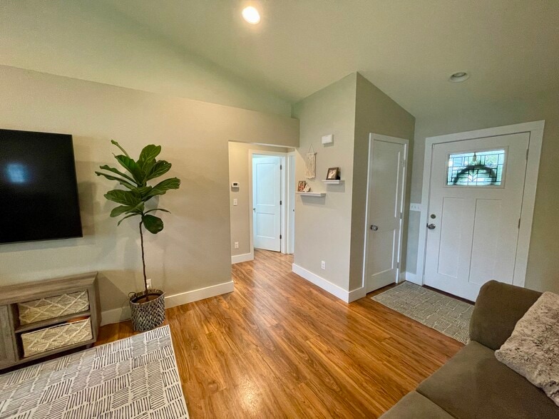 Living Room heading toward guest bath and two bedrooms. - 627 N 3rd St