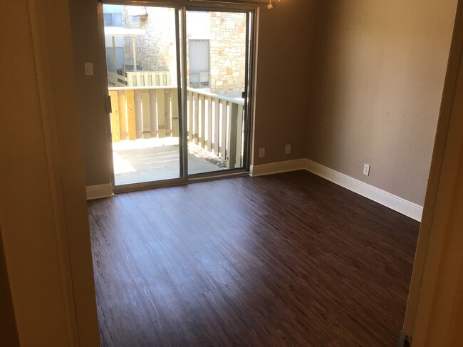 Front Bedroom & Front Patio - 1008 Clayton Nolen Dr