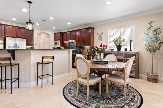 Building Photo - Spacious Mountain’s Edge Home with Den, Sunroom, 3-Car Garage & Private Spa Retreat