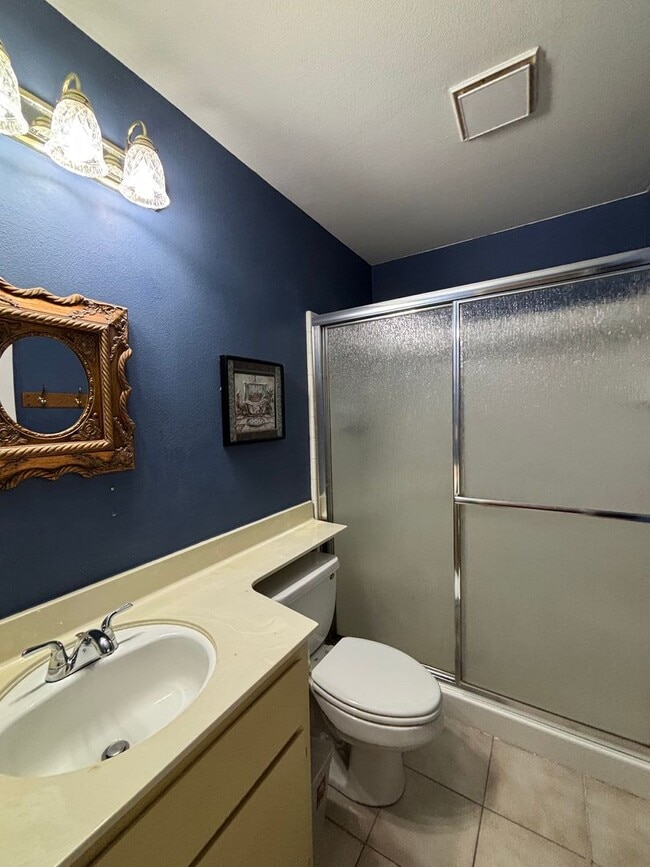 Building Photo - Beautiful Single-Story Townhome on Corner Lot with Private Courtyard & 2-Car Garage