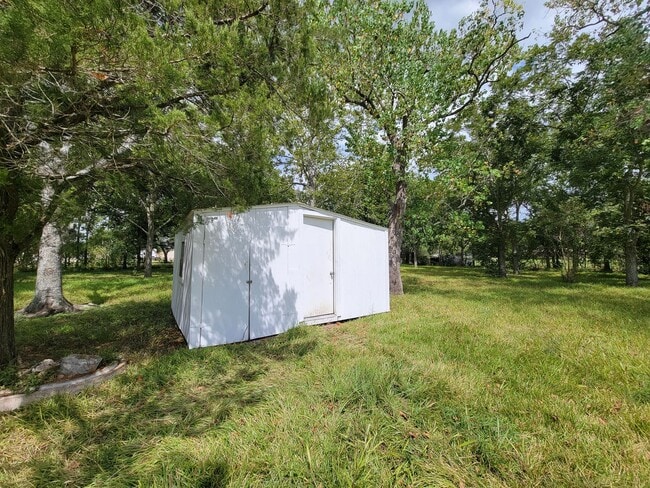 Building Photo - REMODELED 4 BEDROOM 2 BATH LEASE HOME IN A...
