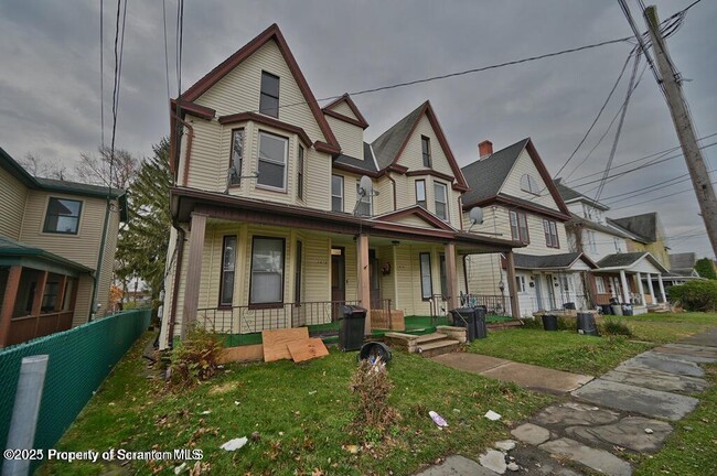 Building Photo - 1416 Capouse Ave
