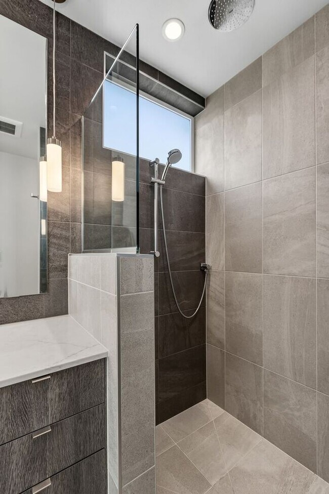 Building Photo - Air Conditioned Hilltop Gem w/ 360° Rooftop Ocean, Mountain and Skyline Views