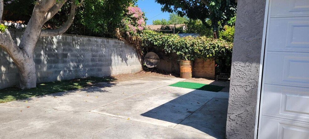 Side of garage - 6851 Wilbur Ave