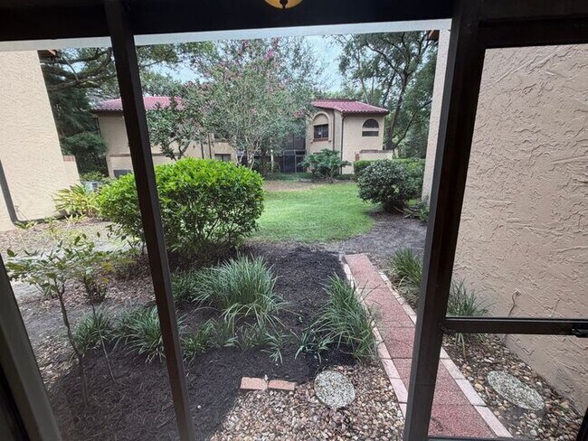 Building Photo - Spacious 2 Bedroom, 2 Bathroom Condo in Gated Lake Pineloch Village!