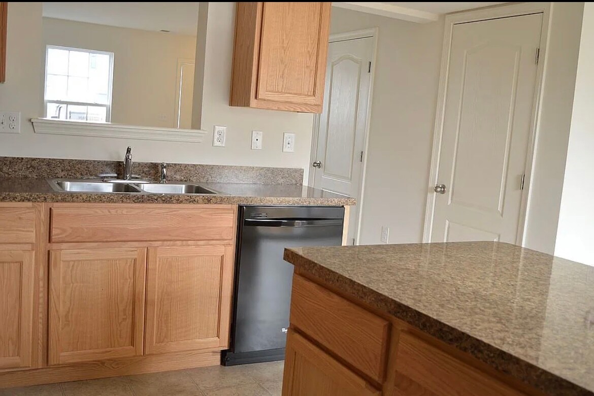 Kitchen with island - 70 Fast View Dr