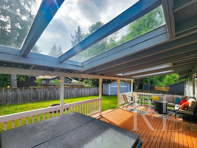 Building Photo - Rambler with Fantastic Covered Deck & Community Pool