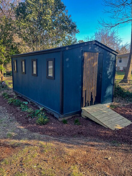 Large 8'x16' shed boasts lots of storage. - 2406 Boswell Rd