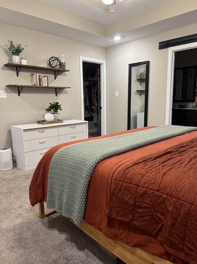 spacious master bedroom with tray ceiling - 2053 Jackie Lorraine Dr