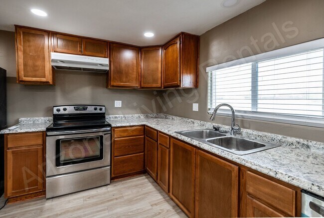 Building Photo - RENOVATED, PRIVATE & SPACIOUS HOME