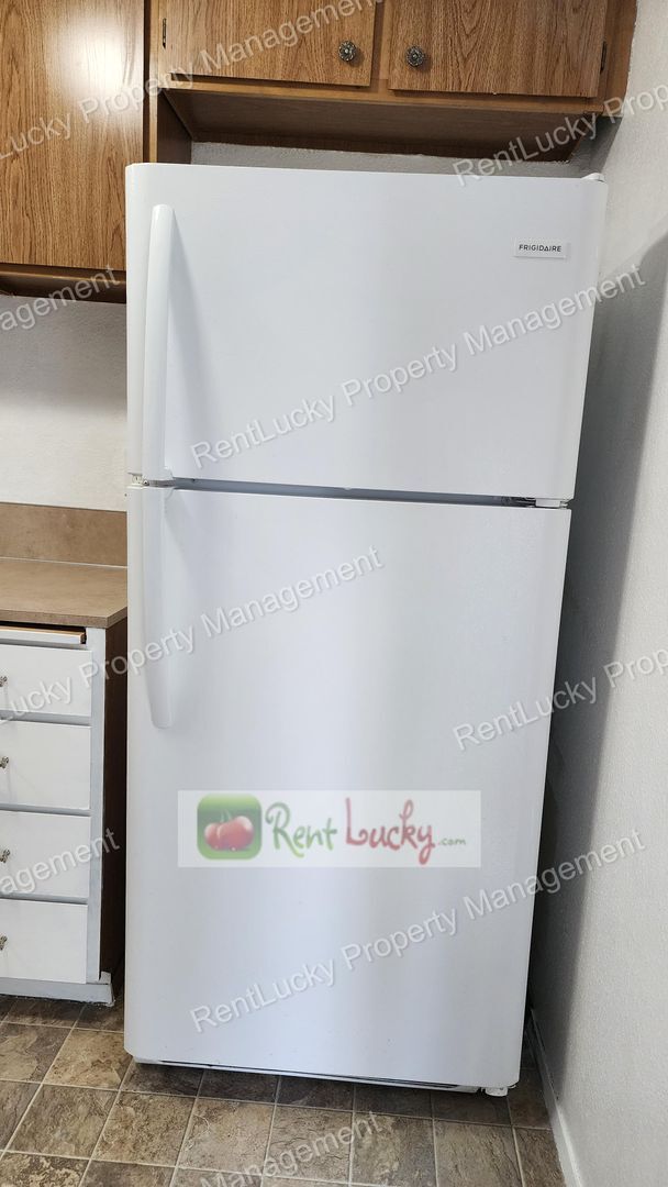 Building Photo - Green-Parkland Duplex