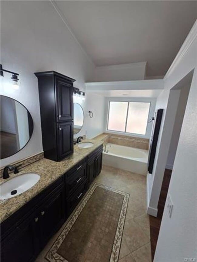 Building Photo - Welcome to this beautifully remodeled sing...