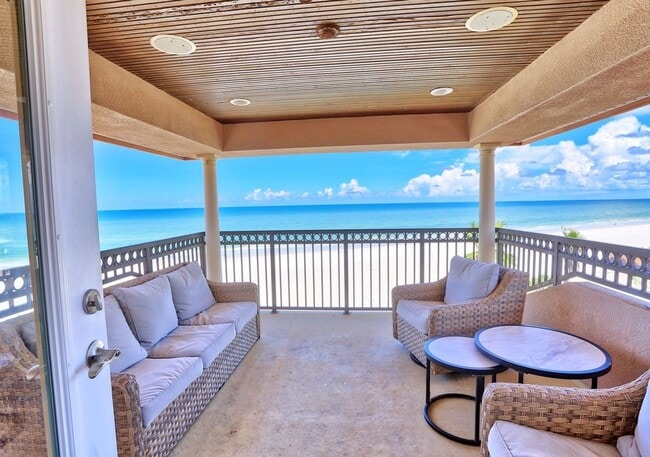 Building Photo - Gulf-Front Luxury Townhouse | 4 Bedrooms + Loft | Sleeps 17 | Game Room & Elevator