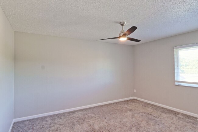 Building Photo - Spacious 3-Bedroom Attached Villa with Finished Basement & Private Fenced Yard!