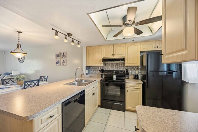 Building Photo - "Charming 2-Bed, 2-Bath Villa in Lake Shore Condominiums"