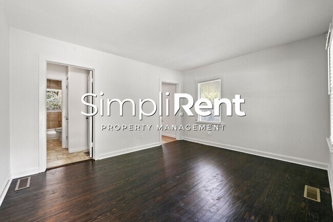 Building Photo - PRICE REDUCED! 1st month's Rent FREE with a 13-month lease!