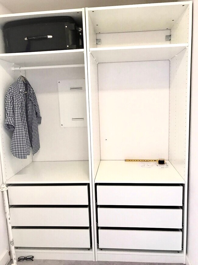 Walk-in closet with updated fixtures - 630 Thomas L Berkley Way