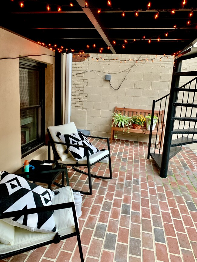 Back Patio (accessible from both bedrooms andenclosed by a garage door) - 2102 1st St NW