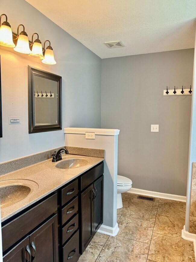 Building Photo - Large Open 4 Bedroom Home with Bonus! Tree Lined Backyard with Privacy Fence!